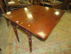 An antique mahogany pembroke table