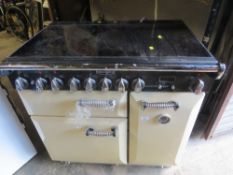 A cream Rangemaster double electric oven