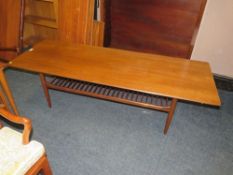 A mid-century IB Kofod Larsen teak G-Plan two tier coffee table L 160 cm