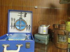 A selection of ships lanterns, camping stove, picnic hamper etc