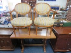 A pair of reproduction Louis XV style upholstered salon chairs