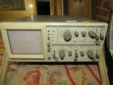 A vintage oscilloscope