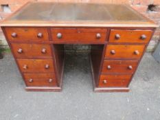 A 19TH CENTURY TWIN PEDESTAL DESK OF SMALL PROPORTIONS, having an inset green leather writing