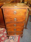 A vintage narrow oak five drawer chest W 46 cm