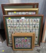Seven assorted framed cigarette cards to include golfers