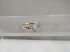 A ring set with opal marked 9ct approx. 1.6g