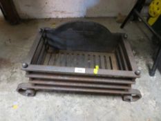 A wrought iron fire basket
