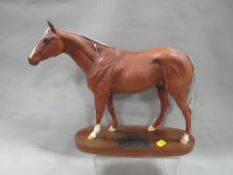 A Beswick figure of a horse on plinth -Grundy