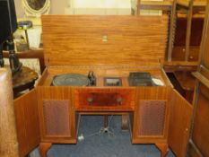 A reproduction walnut case Garrard radiogram with Dynatron amp, cassette recorder, etc.