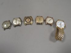 Six vintage gents mechanical wristwatches, to include MU-DU, Tissot and Herma