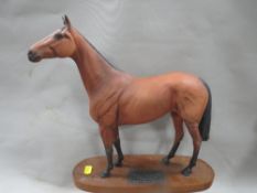 A Beswick figure of a horse on plinth - Red Rum