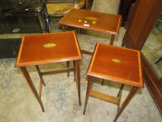 An Edwardian mahogany inlaid nest of tables