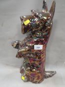 A vintage scottie dog door stop / companion stand