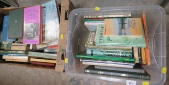 A tray of vintage fly fishing together with a box of angling books
