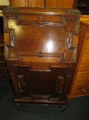 A vintage unusual narrow oak carved bureau W 61 cm