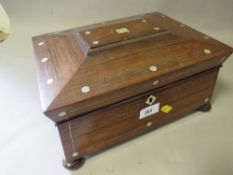 A mother of pearl inlaid sewing box and contents