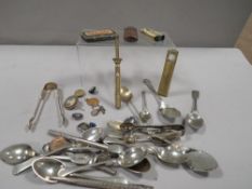 A box of collectables to include silver teaspoons etc