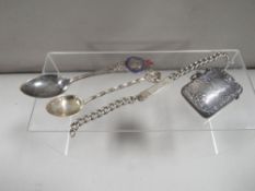 A hallmarked silver vesta case, ID bracelet etc