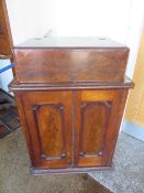 An unusual 19th century mahogany desk with lift up lid opening to reveal a leather writing surface W