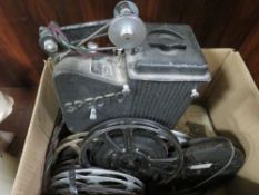 A vintage Specto film projector and reels of film