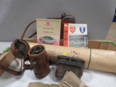 A tray of collectables to include a World War 2 army kite, Carl Zeiss 8 x 30 binoculars, cased