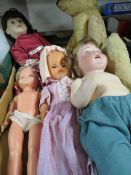 A tray of vintage dolls