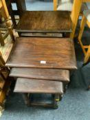 Two oak nest of tables