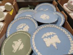 Two trays of Wedgwood blue and green jasperware including plates etc