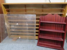 A multi shelf model display cabinet together with another A/F