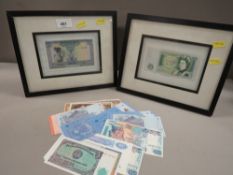 A collection of world banknotes, loose and in frames, to include uncirculated examples