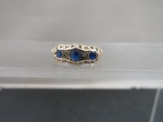An antique Chester hallmarked 9ct gold ring set with sapphires and diamonds, size Q, weight 2g