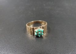 A 9ct gold ring set with turquoise decoration approx. weight 3.7g