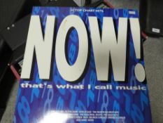 A case of LP records together with a Japanese mini 44 slide project kit