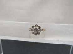 A 9ct gold hallmarked diamond cluster dress ring, size L, weight approx. 2.4 g