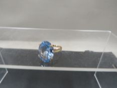 A hallmarked 9 carat gold blue topaz style type ring approx. weight 4g