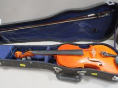 A cased Chinese student violin