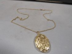 A hallmarked 9 carat gold locket on a 9ct chain overall weight 5.6g