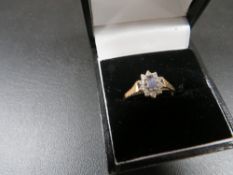 A hallmarked 9ct gold gem set ring, size M