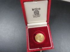 A Queen Elizabeth II full sovereign dated 1967