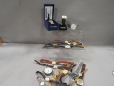 A tray of assorted vintage wrist and pocket watches