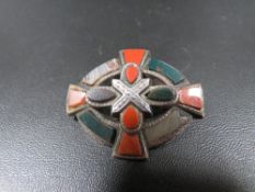 A Celtic hardstone Scottish type brooch set in white metal