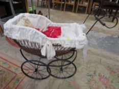 A reproduction wicker Victorian style dolls pram