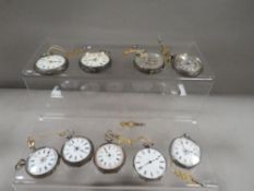 Nine Victorian silver cased pocket watches and keys