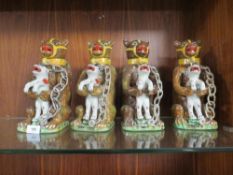 Four reproduction bear tea pots