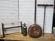 A vintage T handled wood auger, a vintage bow saw, a vintage fire extinguisher and a vintage bed