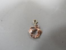 A 9ct rose gold Clogau gold charm