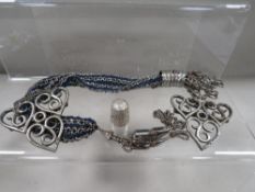 A Georgian cut steel pure, hallmarked silver nurses buckle and silver thimble