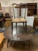 An Ercol oval coffee table (minus badge) together with a bedroom chair. (2)