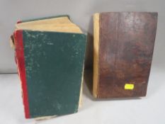 An antique copy of Mrs Beeton's cook book together with an 1823 edition of the Cook and Housekeepers