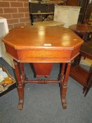 An antique oak sewing table